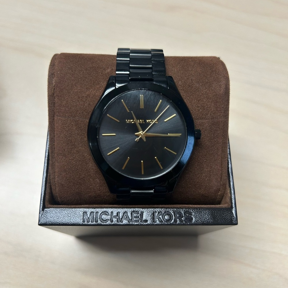 Michael Kors Black and Gold Timepiece